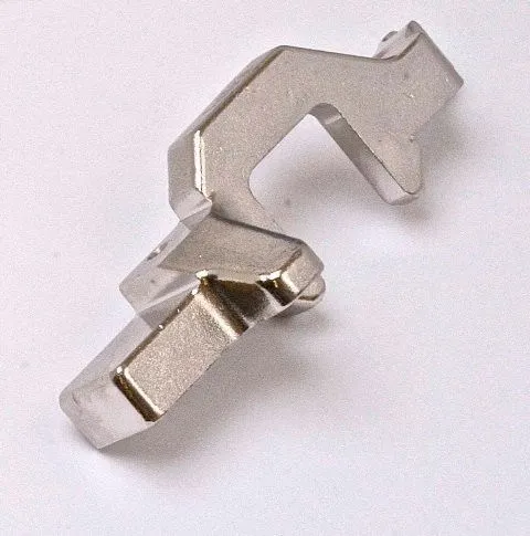 Close-up of a single chrome-plated stepped timing locking bracket showing shoulders and recesses