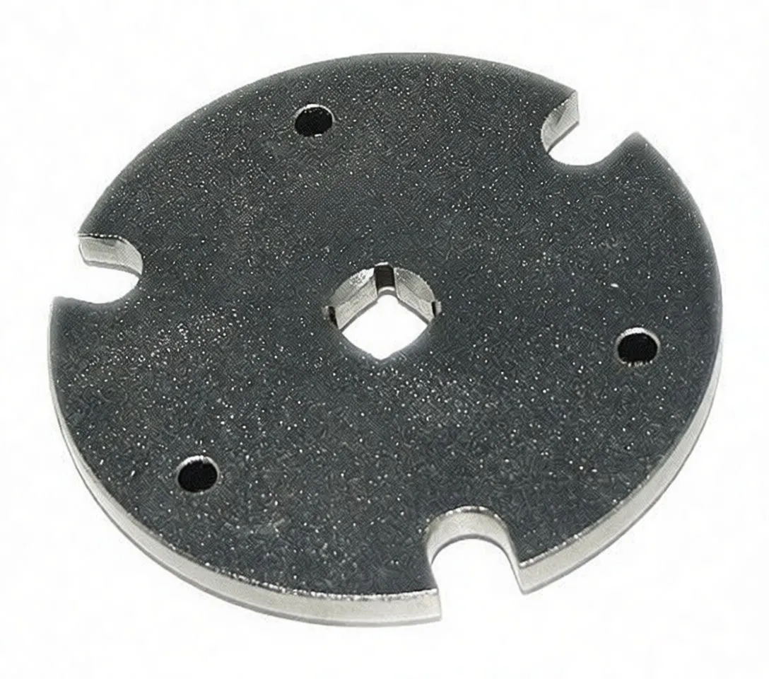 Round steel timing lock plate with two notches, three small holes, central square recess and 'satra' marking