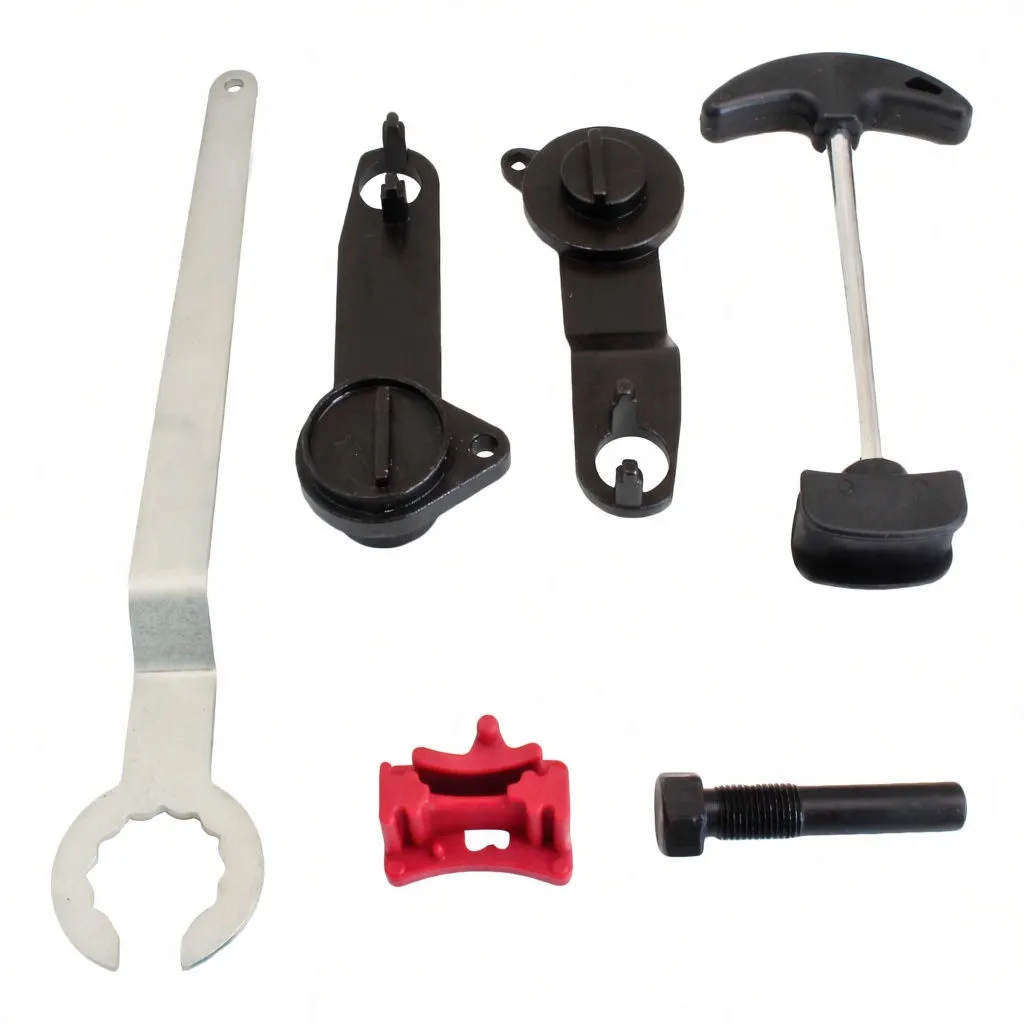 Tools laid out on white: silver spanner, two black locking plates, T-handle, red clip, and black bolt