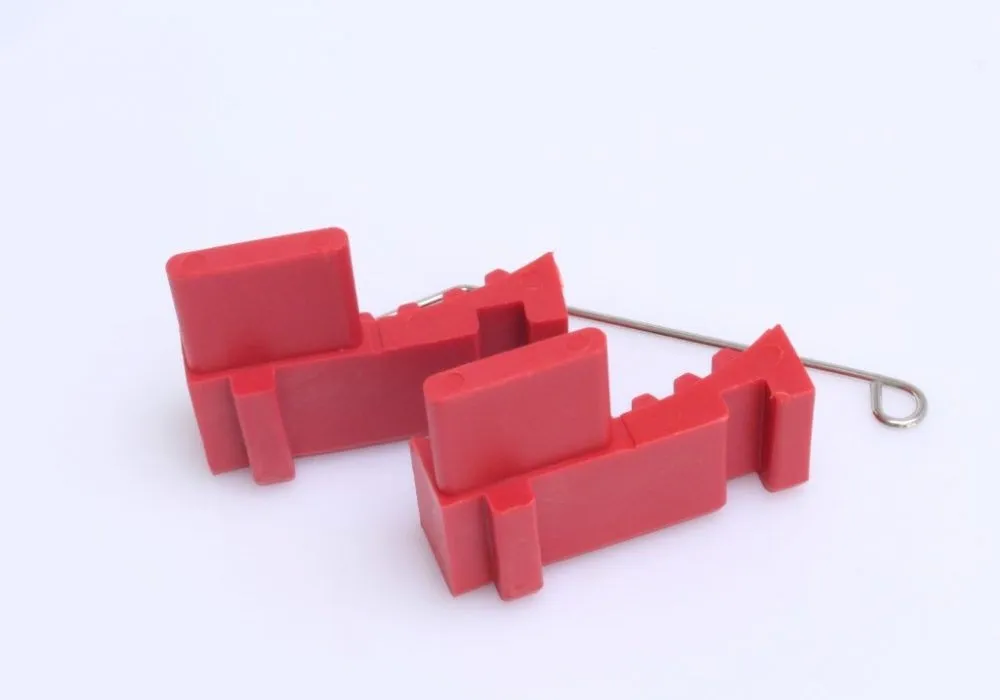 Side/rear view of red timing tool blocks showing internal slots and metal pin