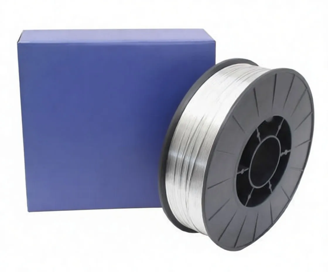 Close front view of aluminum alloy welding wire spool beside blue saTra box with multi-language labeling
