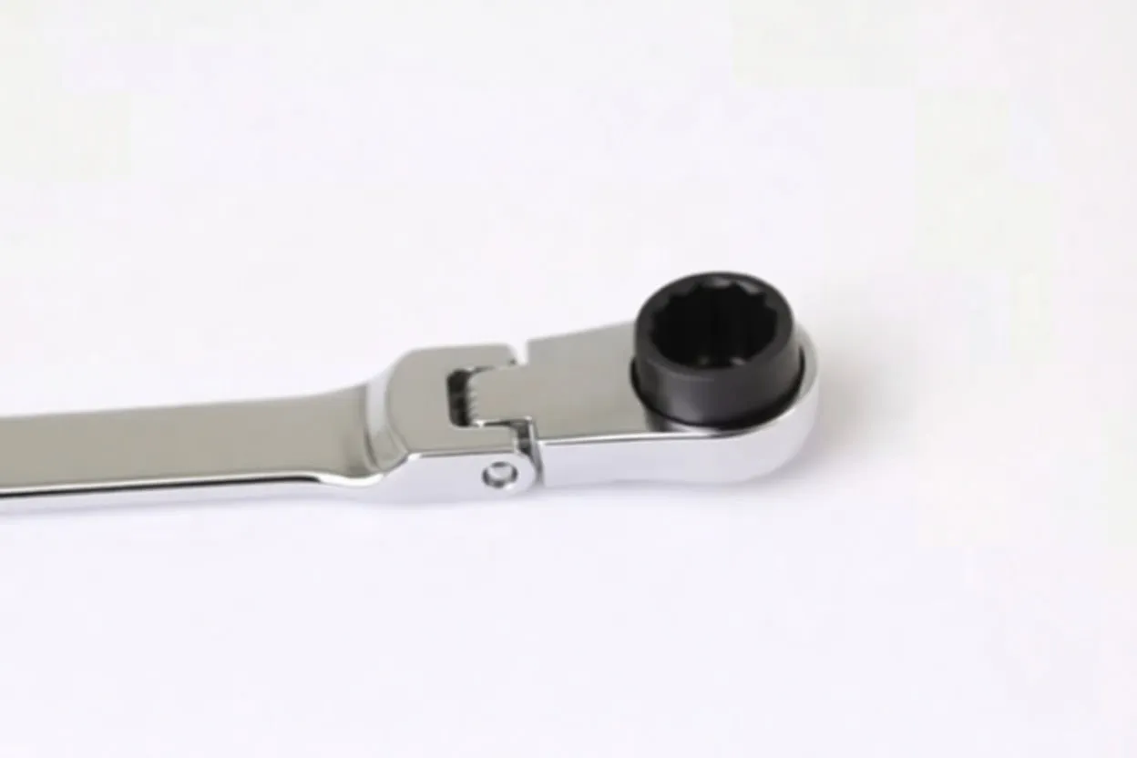 Close-up of ratchet end showing hinged joint, black ratchet insert and switch