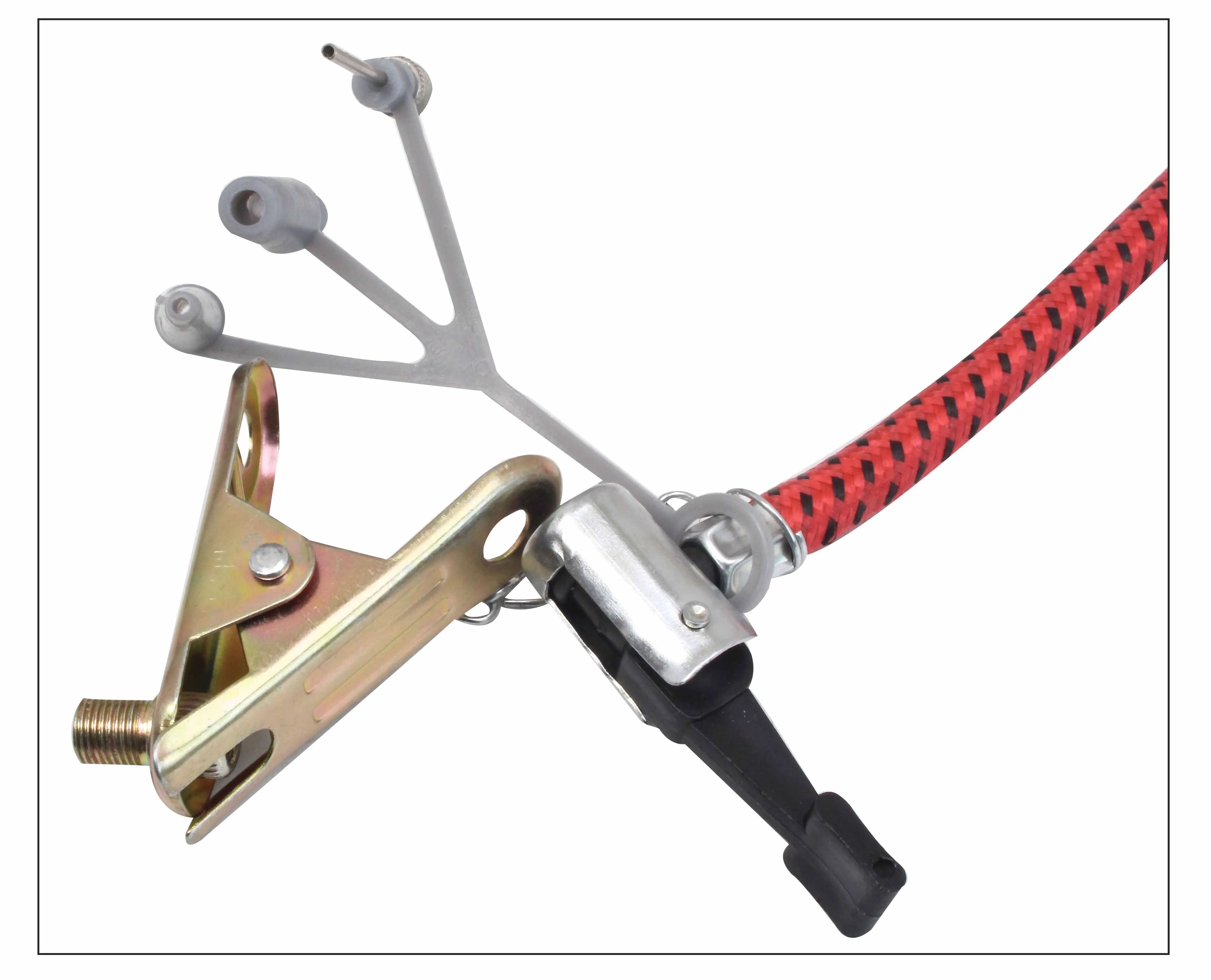 Close-up of braided hose end with metal swivel, black lever chuck, brass clamp and grey multi-tip adapter