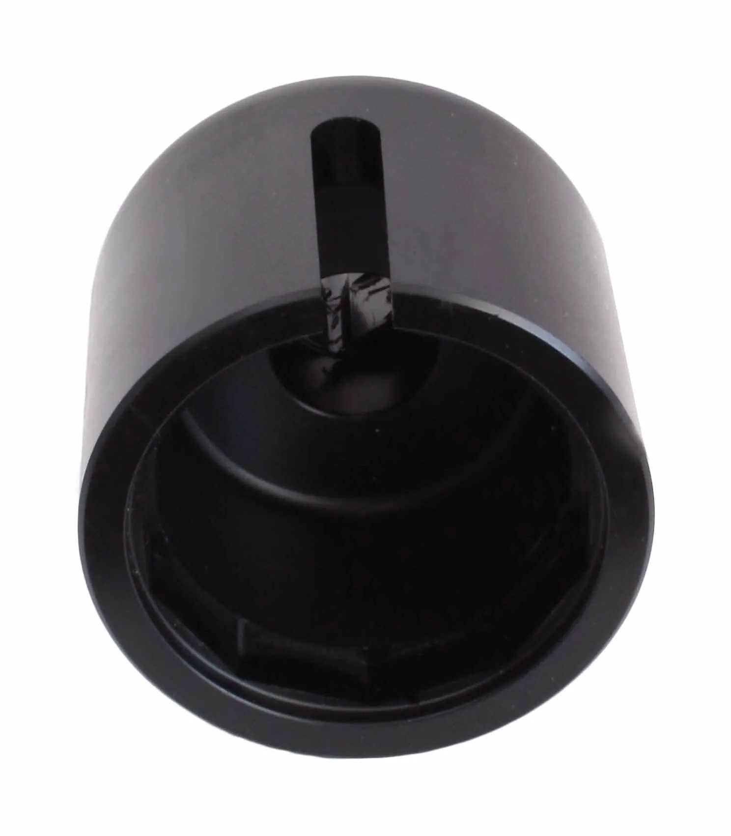 Top-down view into the black fork cap socket showing internal ribs, cavity profile and side slot