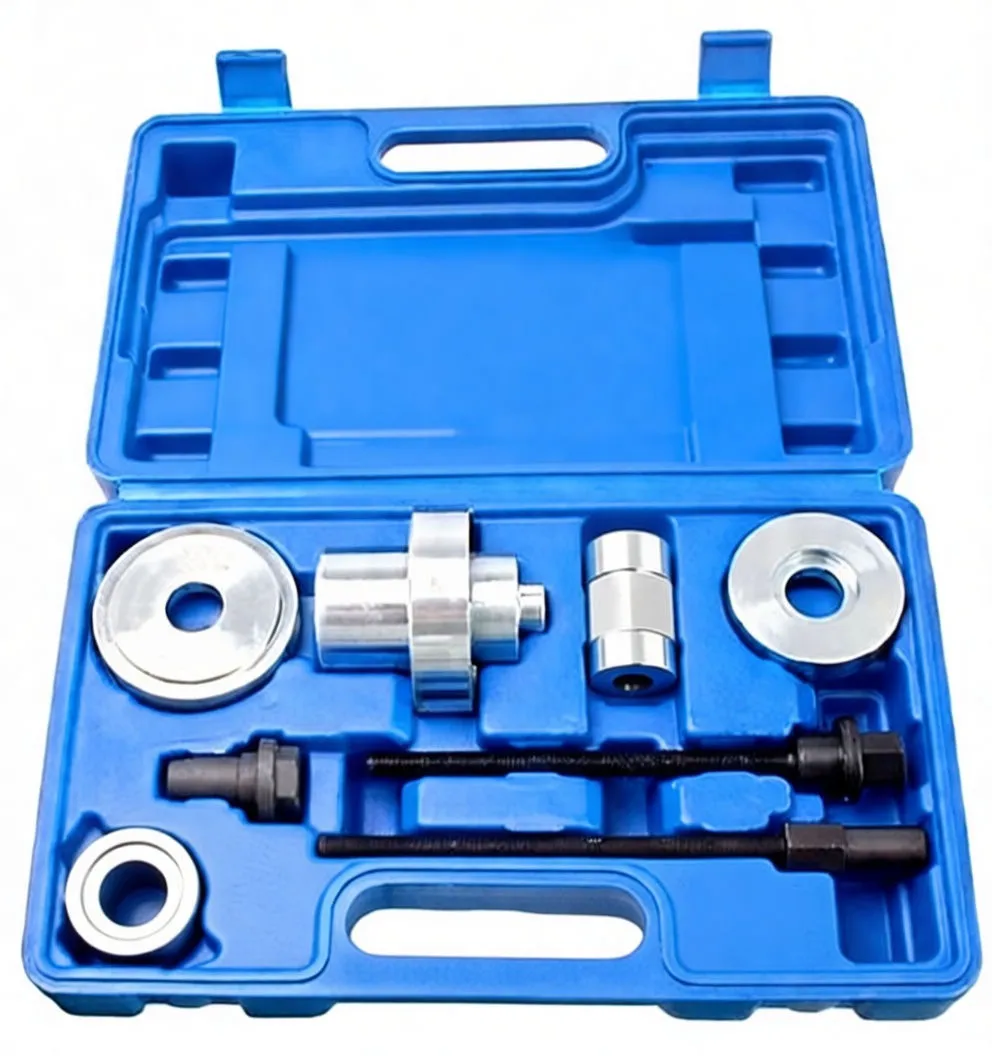 Top-down image of blue case with bush puller components — discs, cylindrical adapter, socket and two black threaded rods marked with 'S'