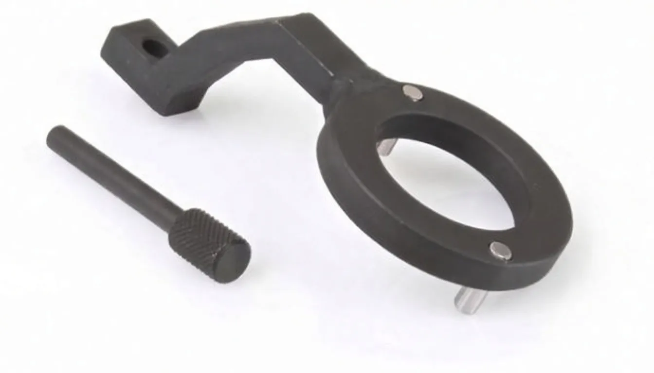 Oblique view of fuel pump holding tool showing ring, locating pins, angled arm with white marking and separate knurled pin.