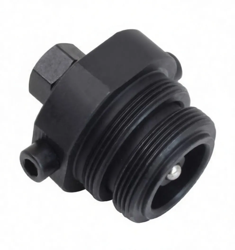 Close-up of threaded end of black sprocket puller showing multiple threads and internal ball bearing with flange and side pin.