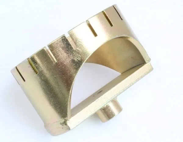 Angled side view of notched cylindrical locking ring tool with square drive boss