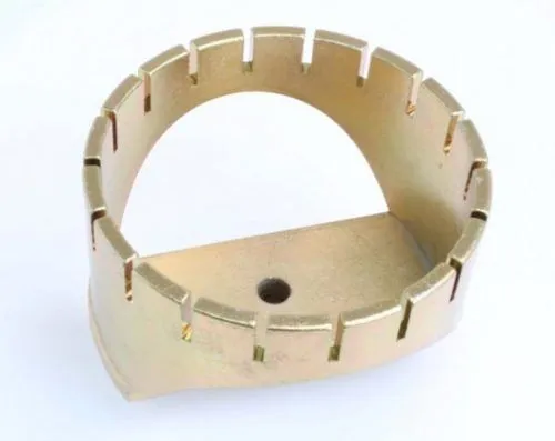 Top-down view of notched circular locking ring tool showing notches and top plate hole