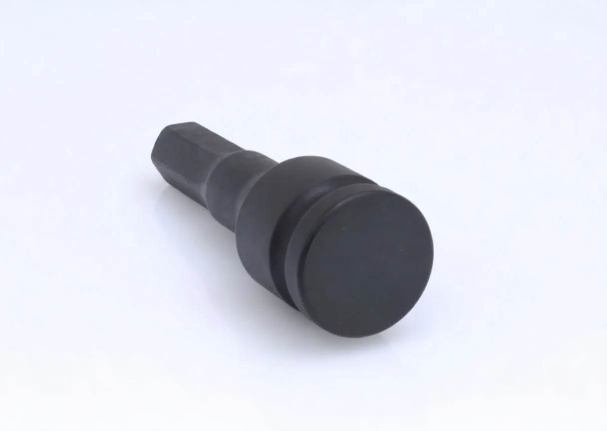 Front-facing view of black impact socket showing 1/2 inch square female drive, collar detent hole and stamped white markings, hex shank visible behind