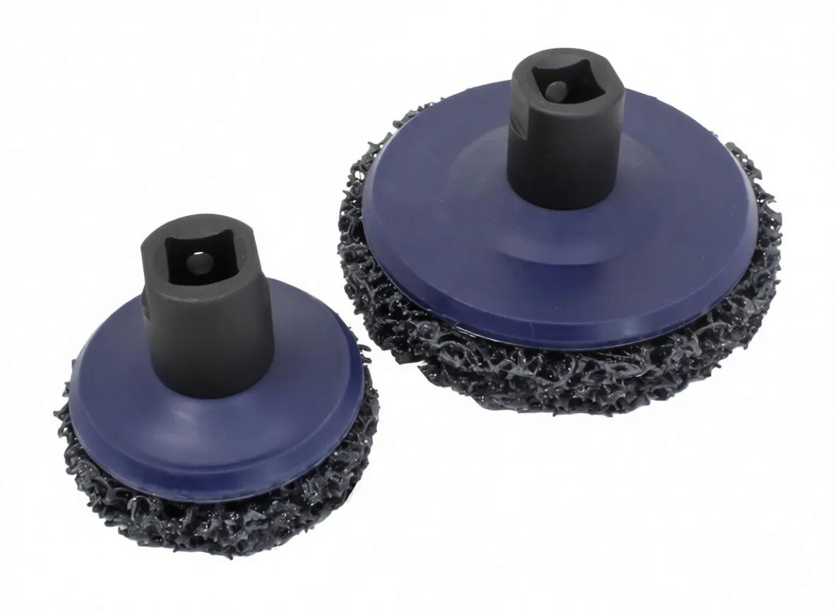 Angled view of two blue-backed rip strip discs with ASTA marked hubs and open-mesh abrasive rings