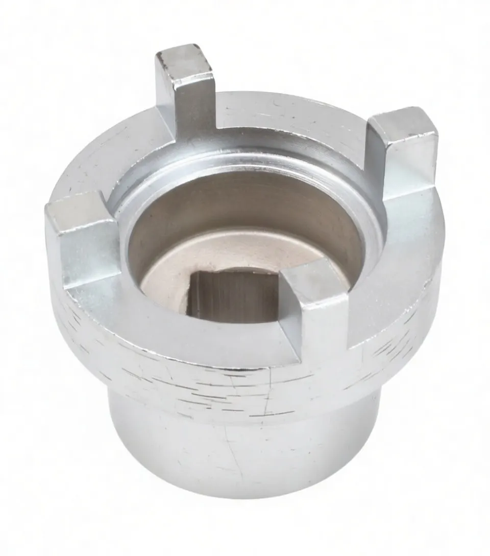 Angled image of swingarm pivot tool showing four tabs and internal cavity, ASTA marking partially visible