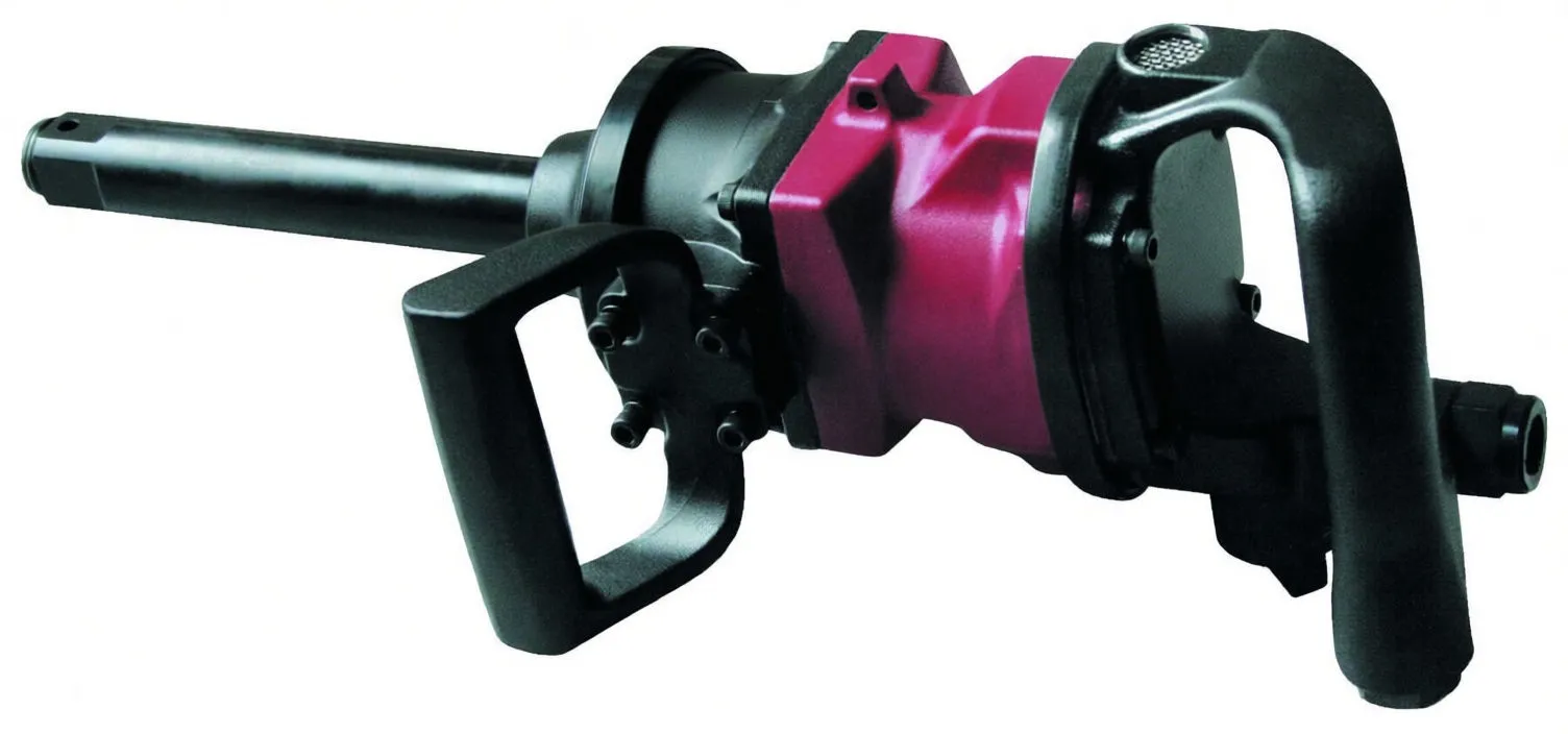 Close-up of magenta impact wrench gearbox and handles showing ASTA branding and a label