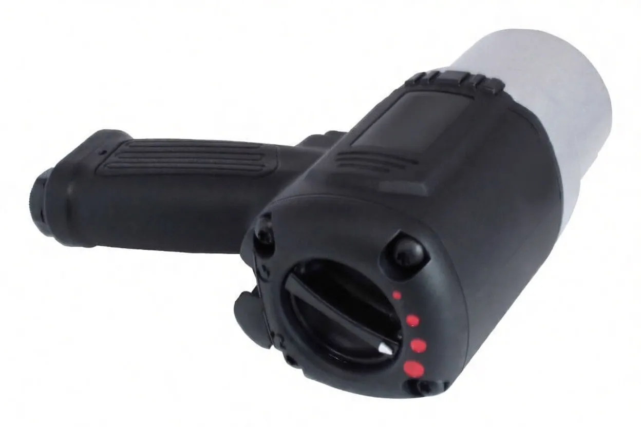 Rear/side view of the impact wrench showing circular back cover, red-dot torque indicators, selector lever and a specification sticker on the silver housing.