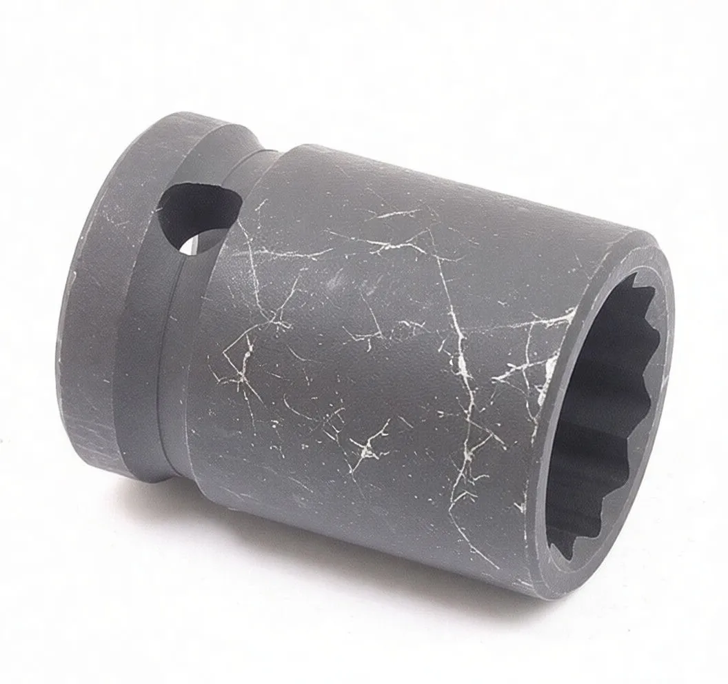 Side-angled image of 18mm impact socket showing 12-point opening, markings and detent hole