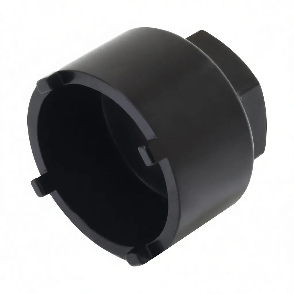 Oblique shot of the black lower ball joint socket highlighting four rim tabs, hex flat and 'ASTA A-LBJ51' branding.