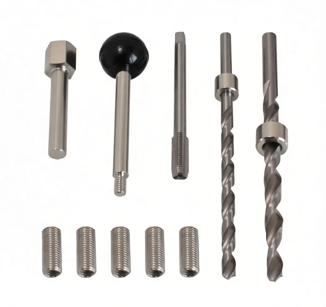 Individual drill shafts, tap, hex sleeve, ball-handle shaft and multiple threaded inserts on white background