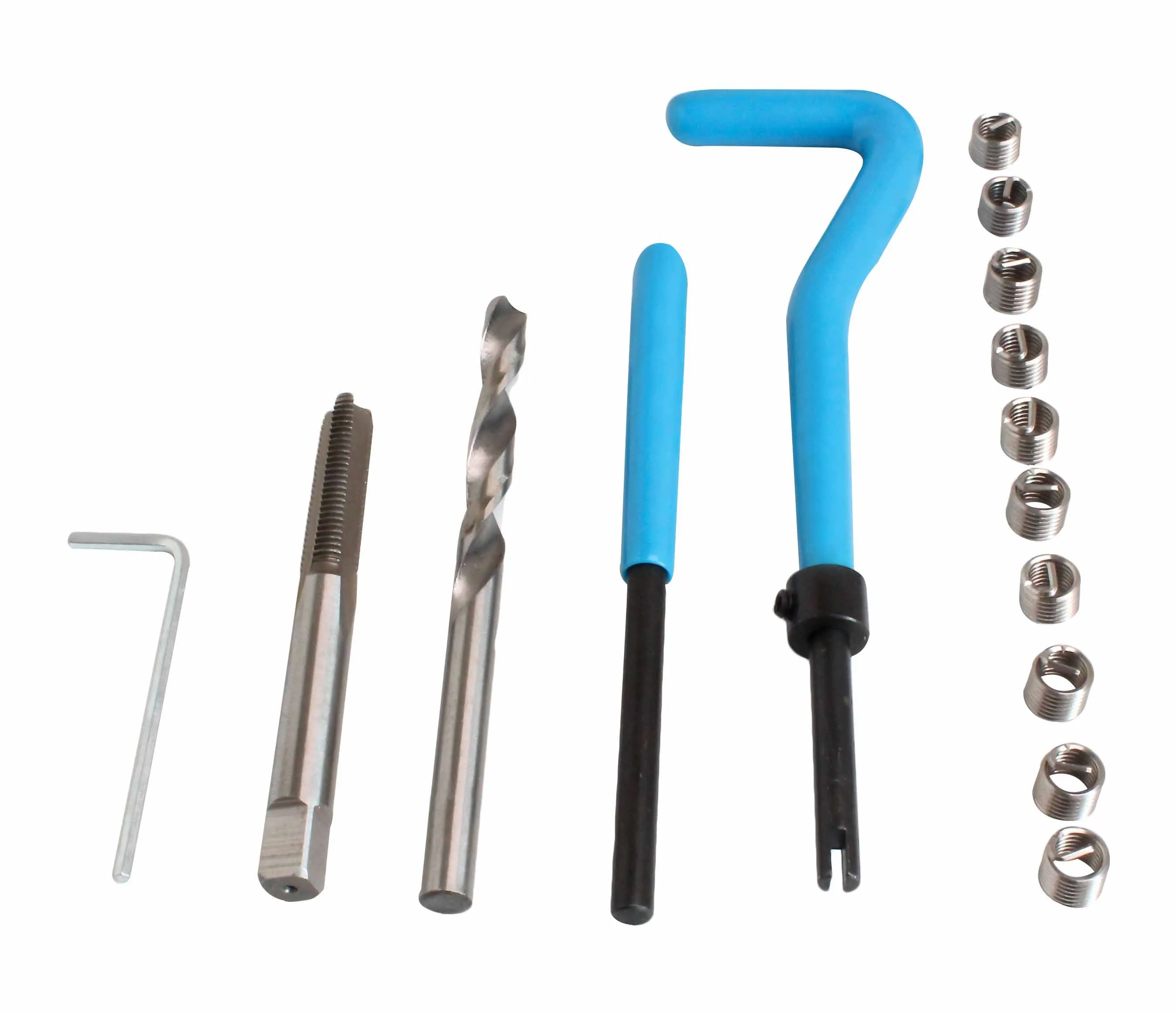 Tools from a thread repair kit laid out: hex key, tap, drill bit, mandrels, blue-handled driver and a column of stainless coil inserts