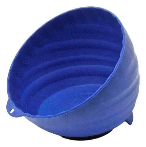 Top/side view into the blue ribbed magnetic parts tray showing interior ribs and a small rim hole