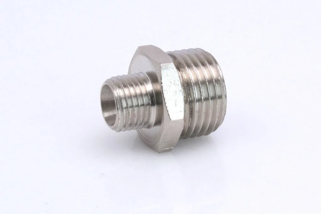 Angled view of a metal reducing threaded connector with hex flats, showing both male thread ends and hollow bore