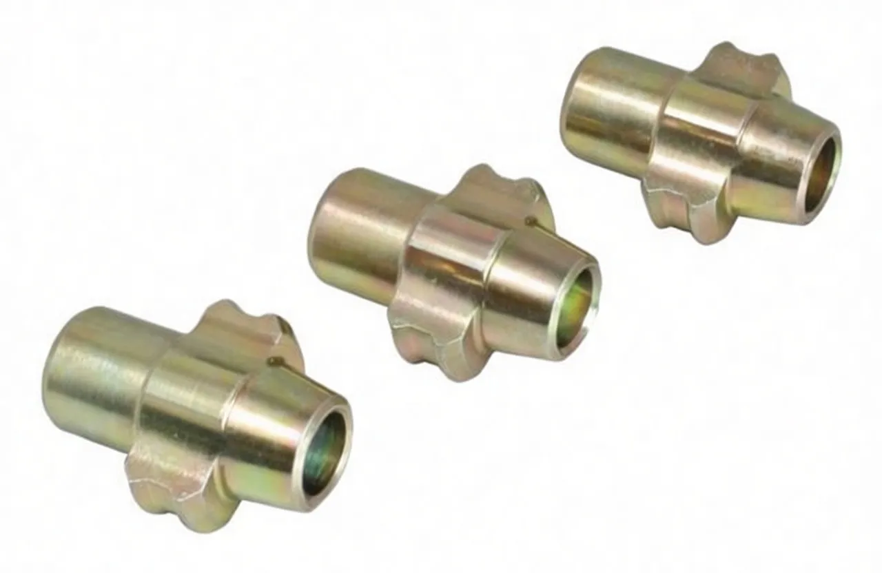 Three gold-plated cylindrical adaptors with flanged central hubs, each stamped with a brand logo and model code, shown on white background