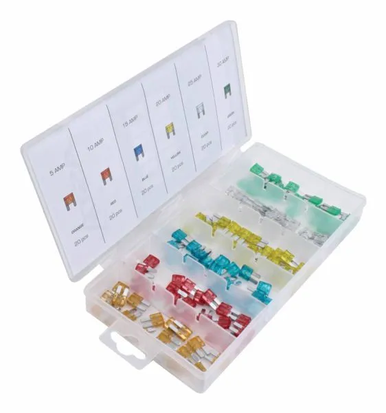 Angled open organizer case with rows of assorted colored blade fuses and a labeled lid showing amperage chart