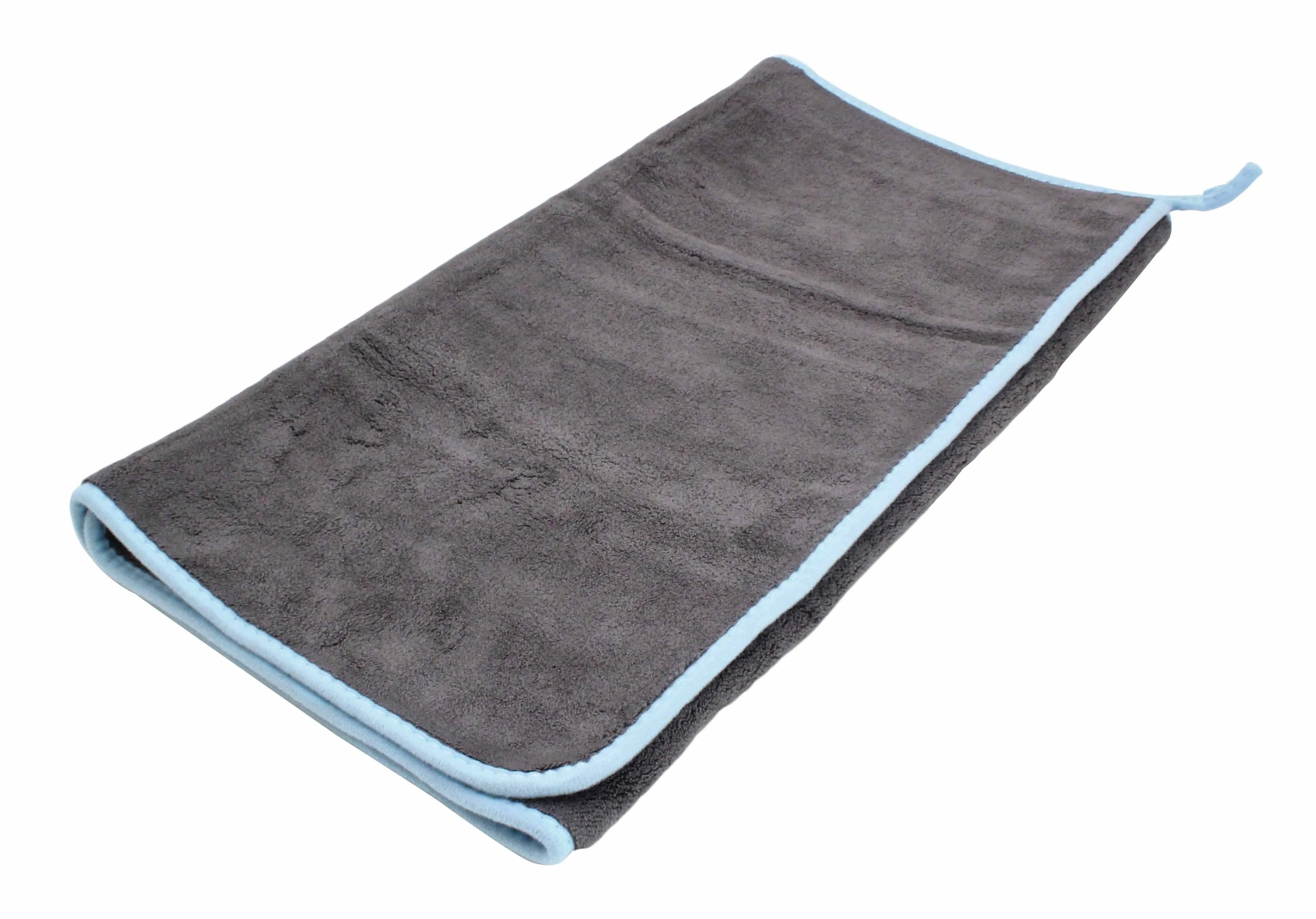 Partially unfolded dark gray microfiber towel with light blue edging and loop
