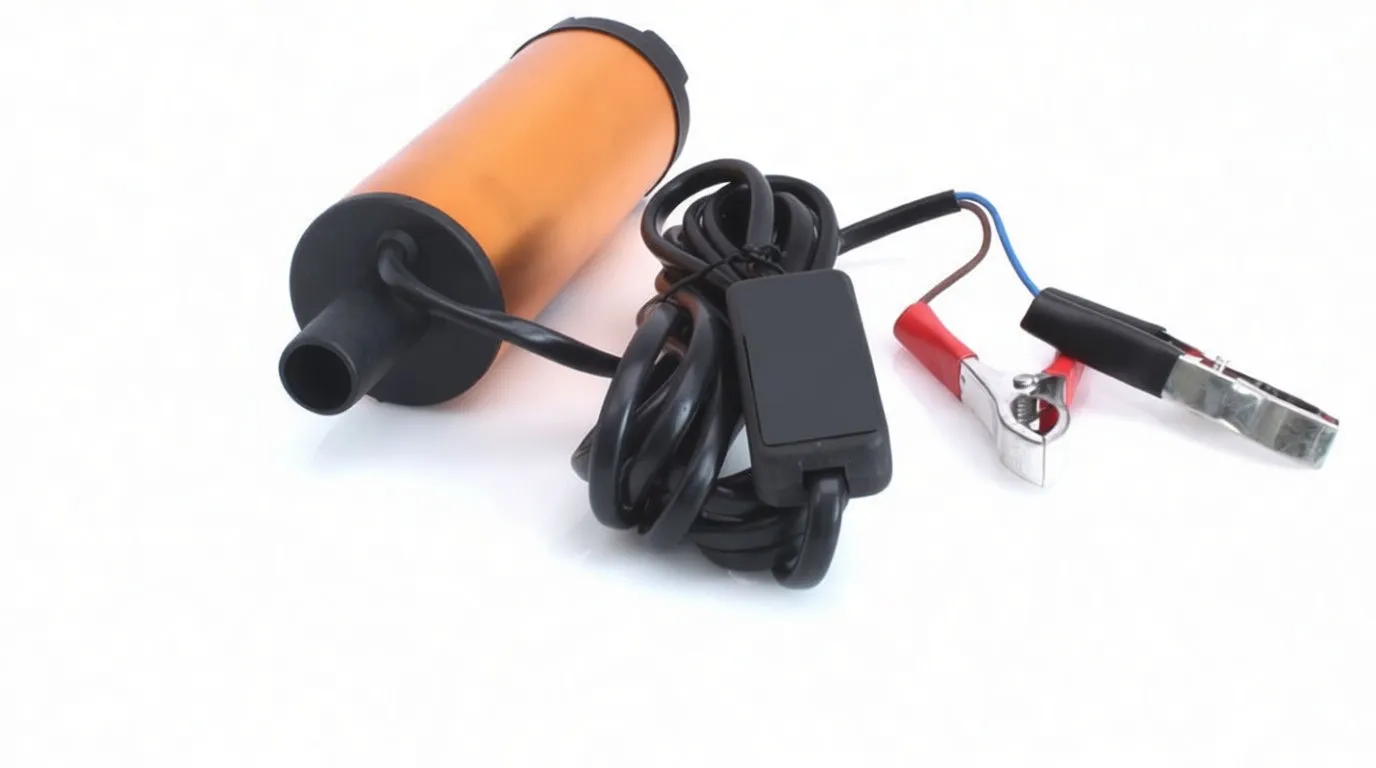 Rear-angle view of a small orange 12V pump with outlet nozzle, coiled power cable and inline switch, and red/black battery clamps visible.