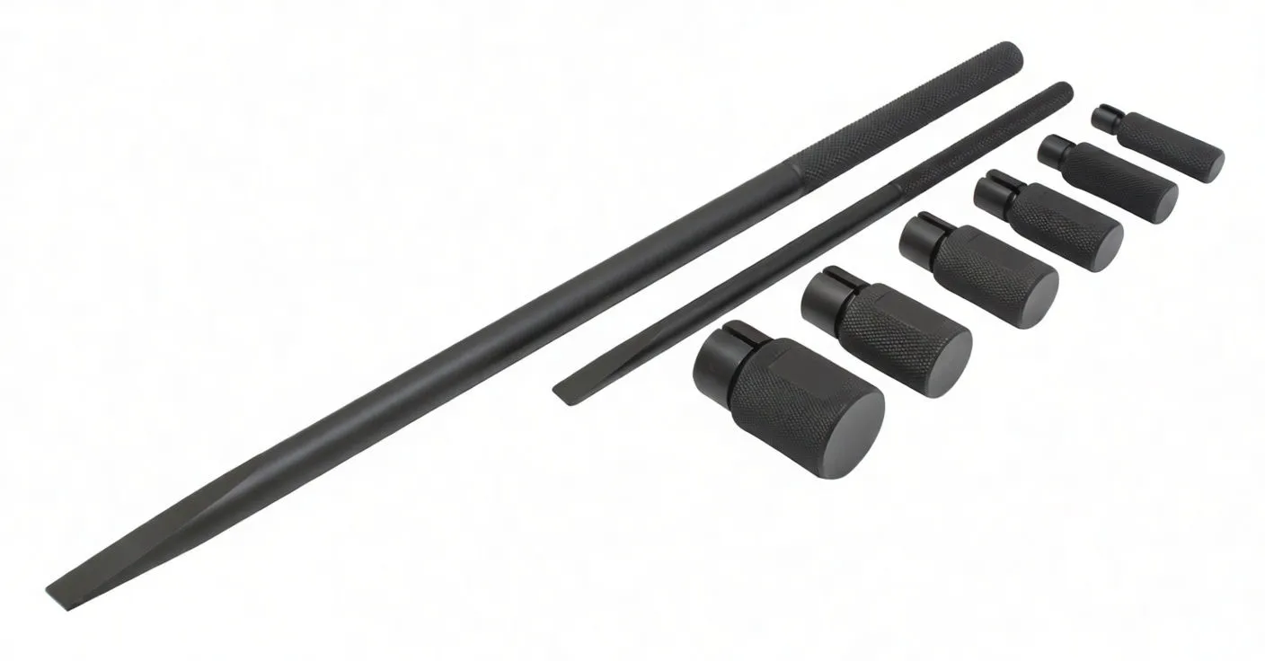 Five black knurled driver sleeves and two long black steel rods laid out on white background