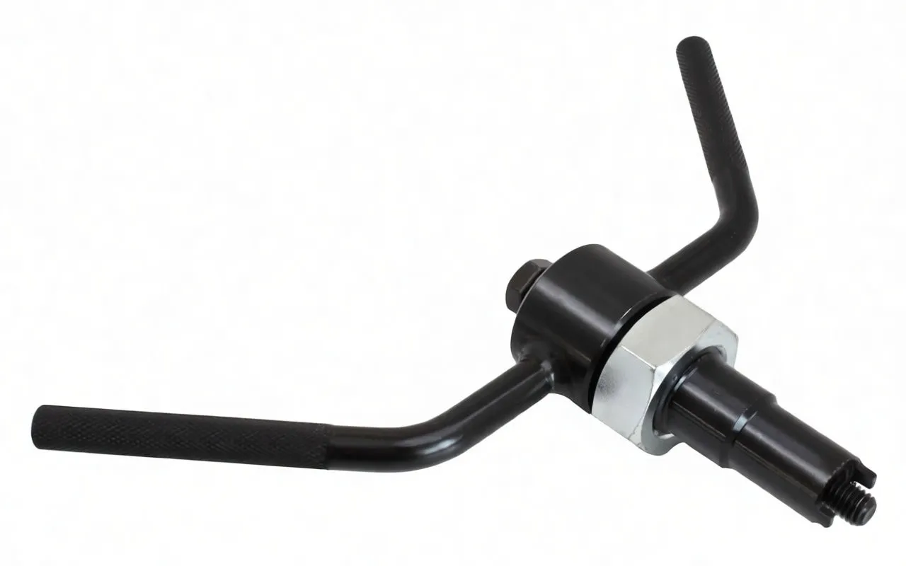 Top/rear angled view of ASTA A-MK384 timing and crankshaft turning tool showing hex bolt, knurled handles, silver nut and slotted threaded shaft.