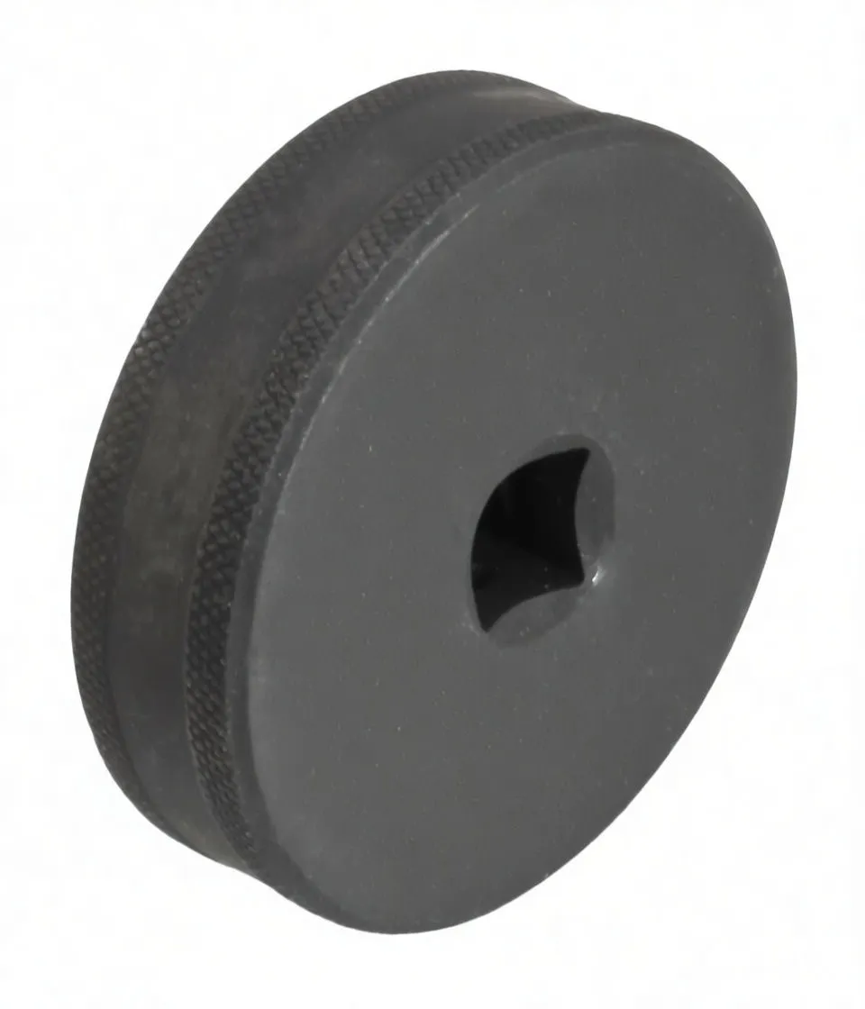 Side view of round impact socket showing flat face with central square drive recess and knurled outer edge with partial white printing.