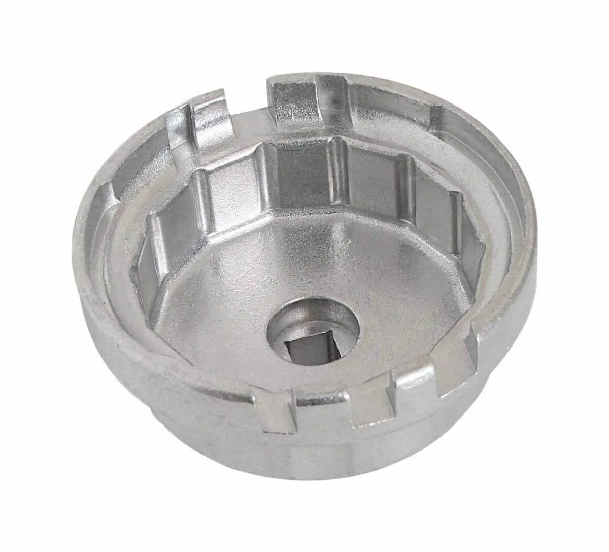 Angled interior view of silver oil filter key showing ribs, tabs, and square drive hole