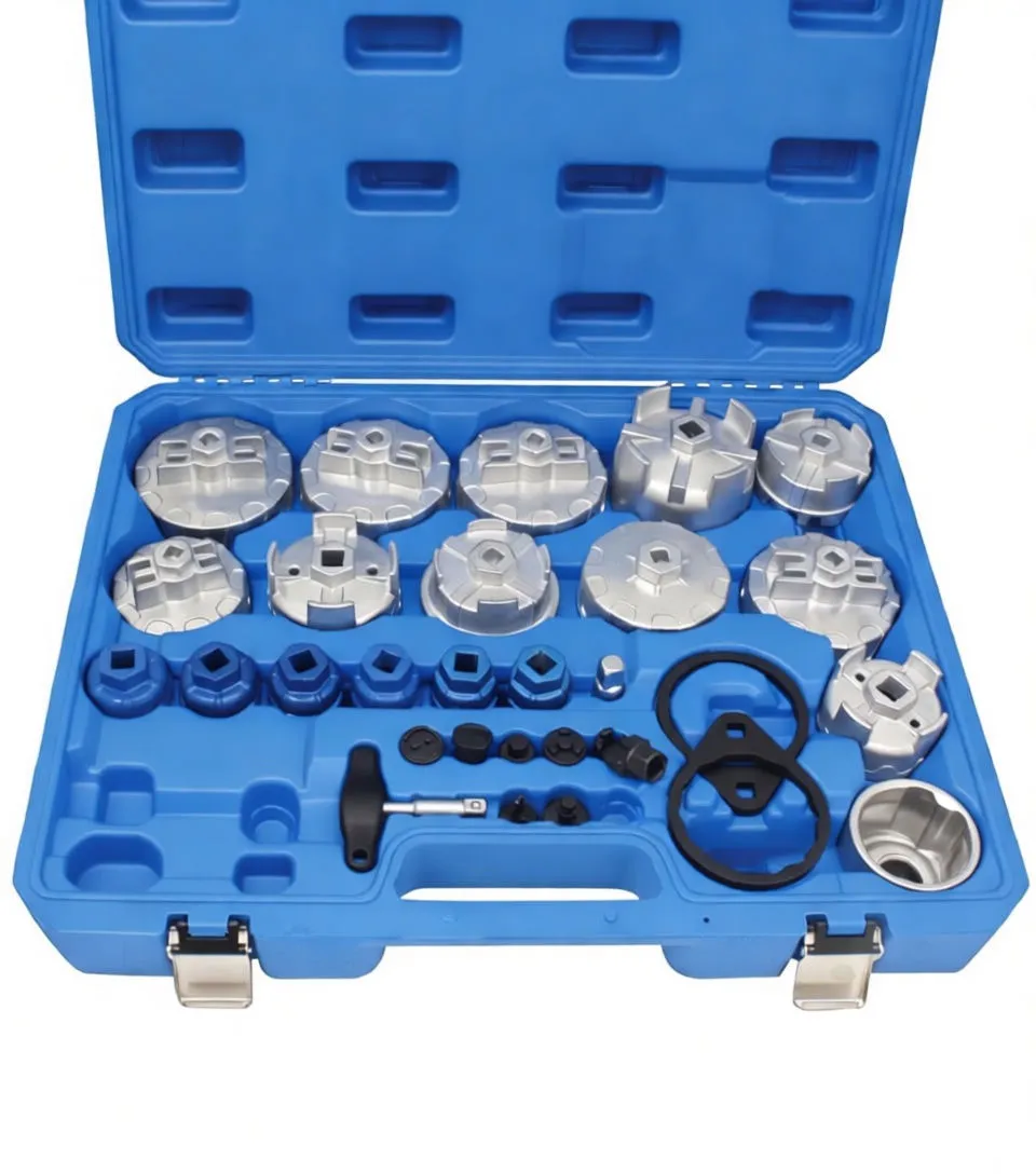 Close-up of an open blue case showing rows of silver oil filter cap wrenches, blue socket adaptors, black mounting blocks and a small ratchet.