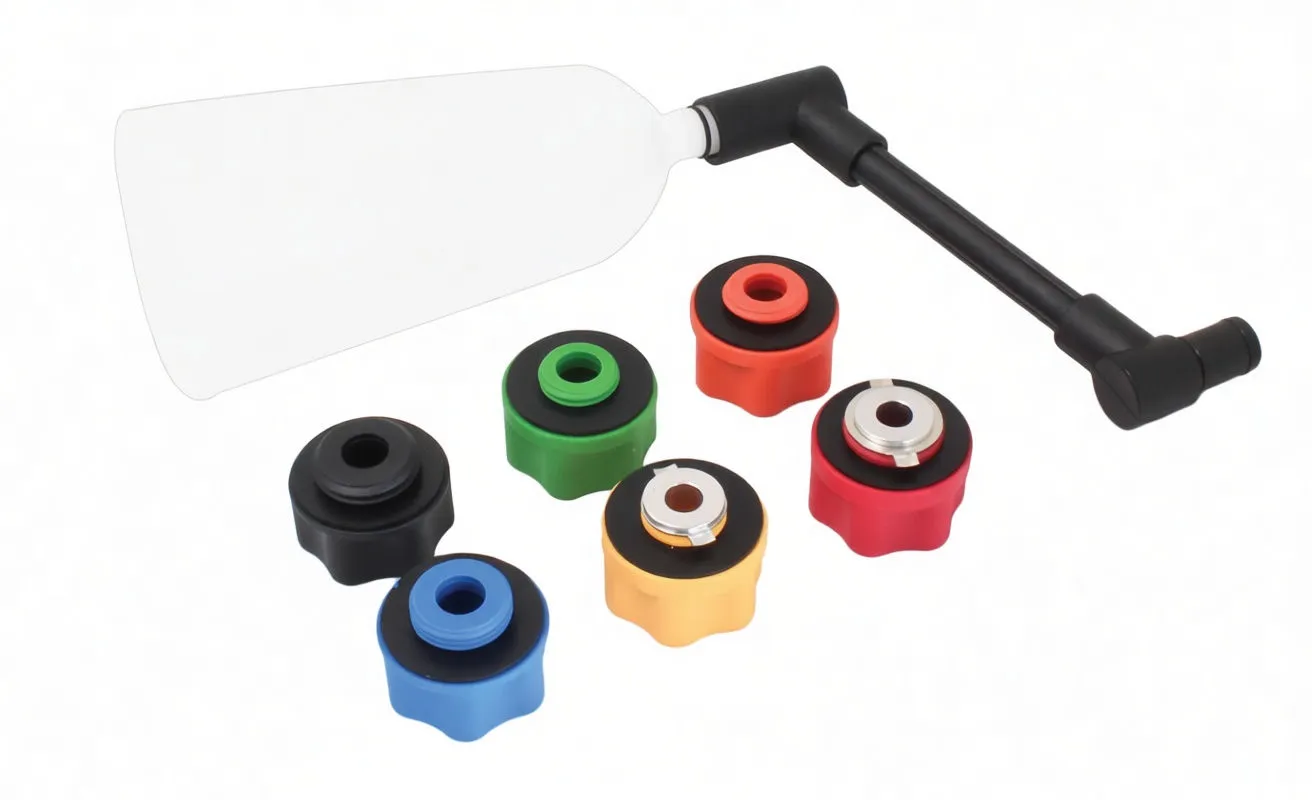 White funnel bottle, black L-shaped spout and multiple colored adapter heads arranged on white background.