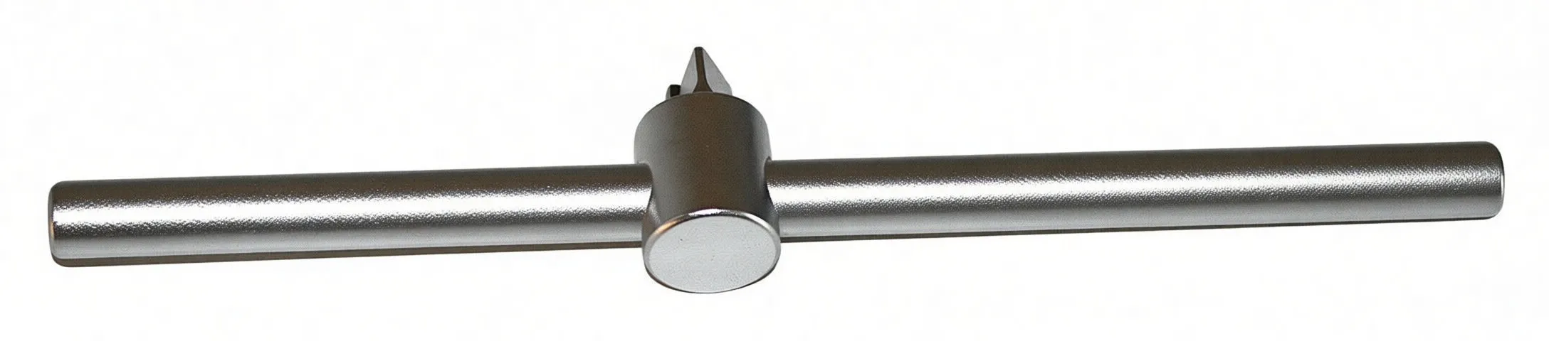 Macro view of a chrome spline oil-plug socket showing internal star profile and stamped markings