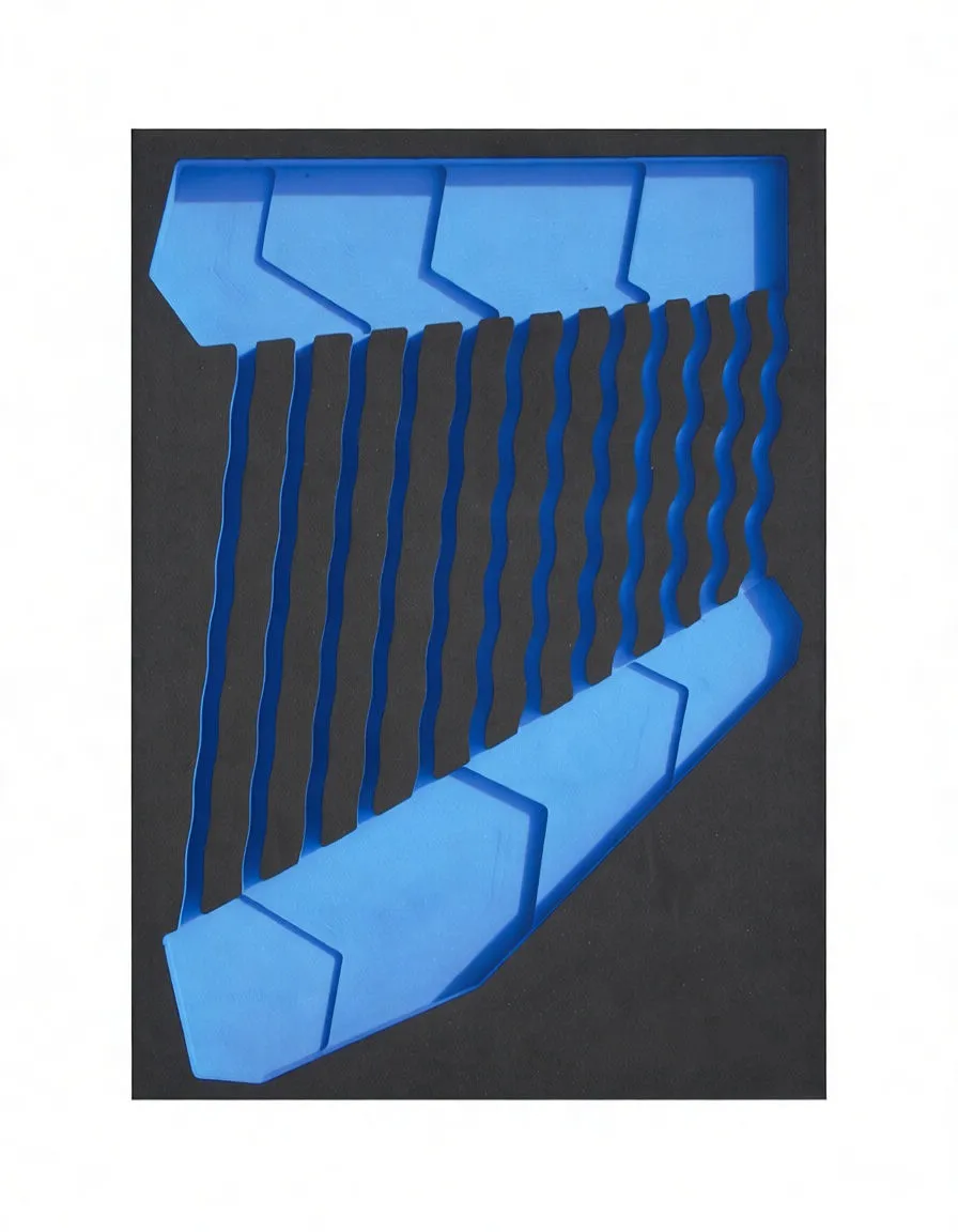 Top view of black and blue foam tool tray with numbered wrench slots and ASTA logo