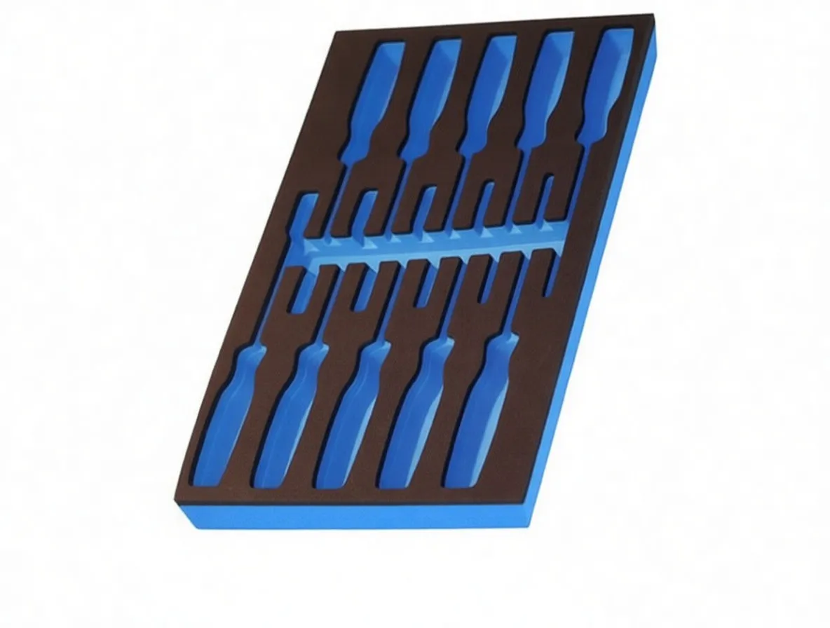 Angled foam tool tray with blue core, many screwdriver-shaped cutouts and printed dimensions 28 cm by 39 cm