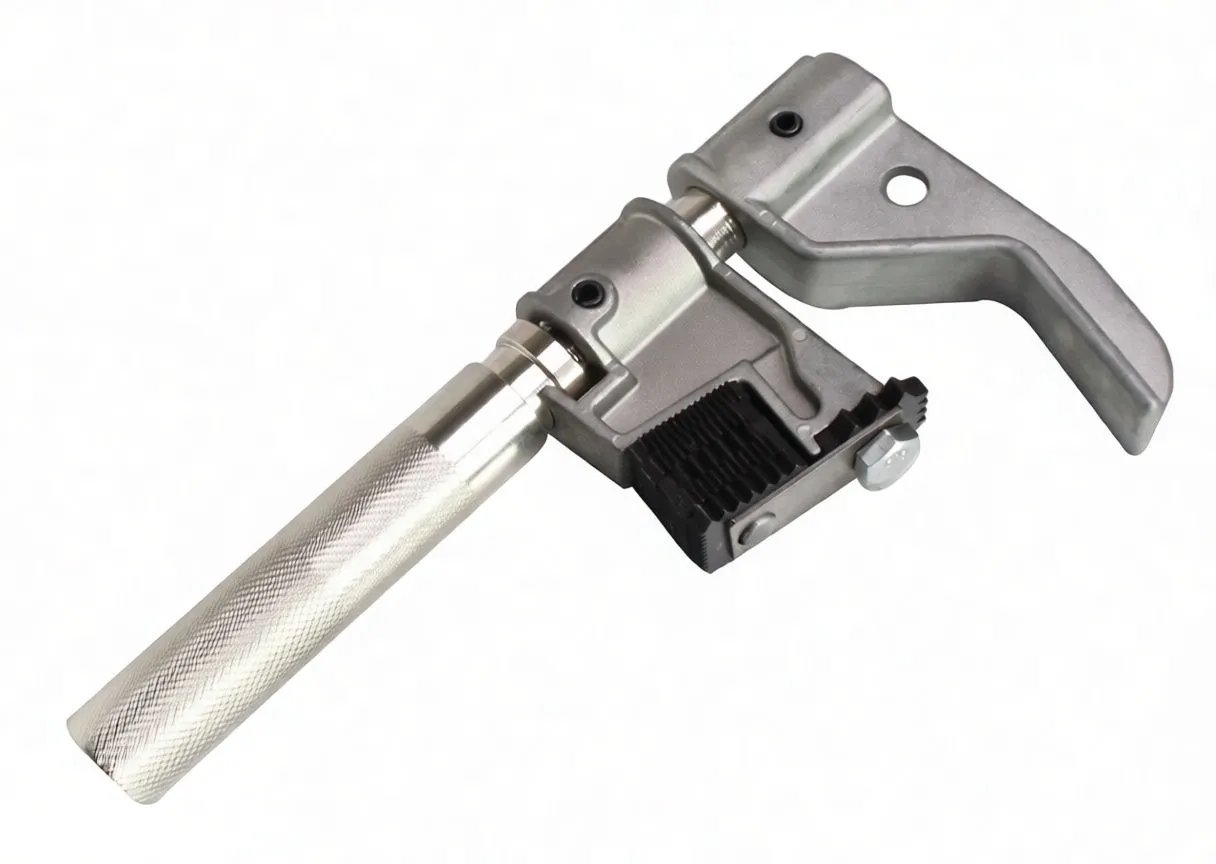 Close-up of the metal thread chaser showing knurled handle, toothed die block, clamping jaw and stamped marking.