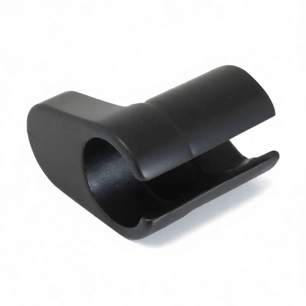 Side angle of black oxygen sensor socket showing open slot, star-shaped drive hole and A-308 marking