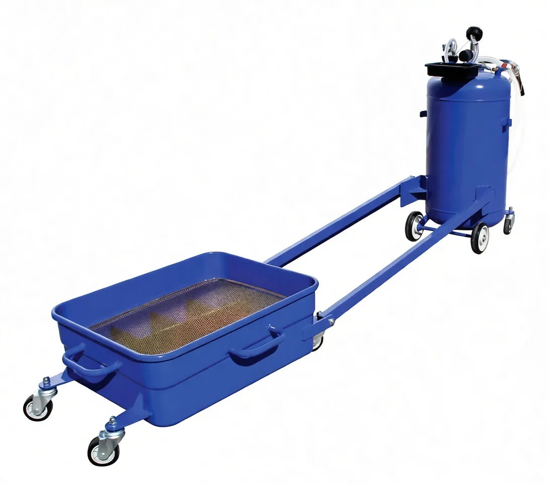 Lowered drain pan on long arms with mesh insert and tank in background