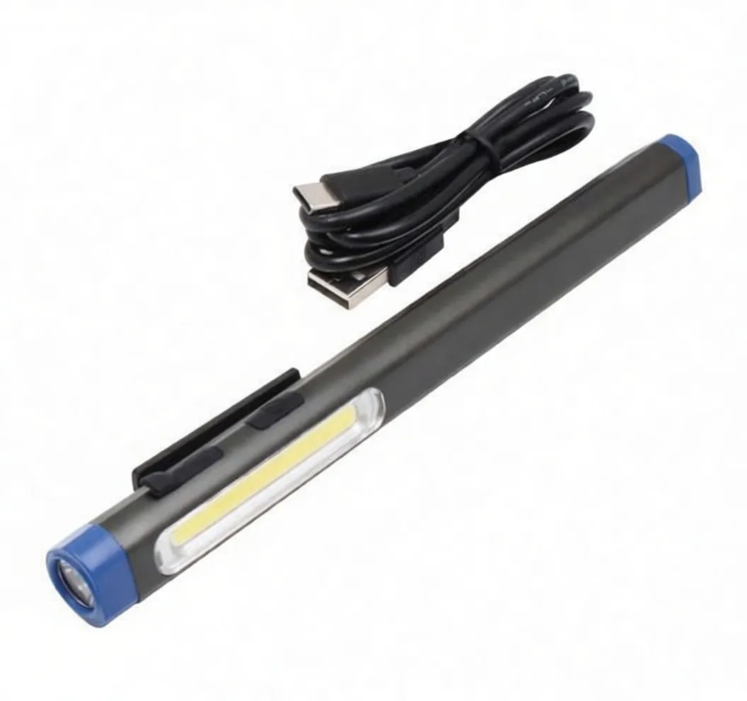 Angled close-up of pen lamp showing COB strip, side clip, ASTA logo and USB-C cable.