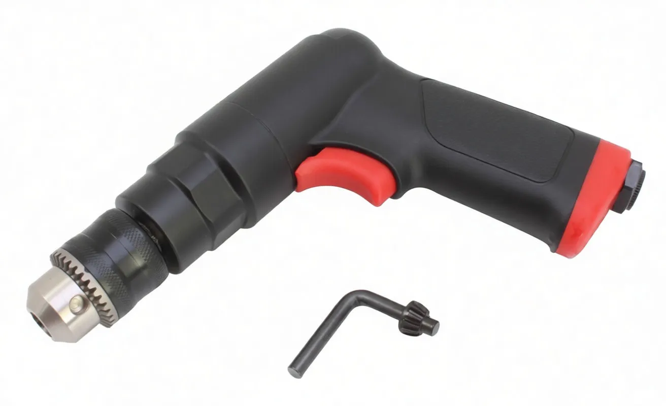 Angled top view of ASTA air drill showing chuck, red trigger and chuck key