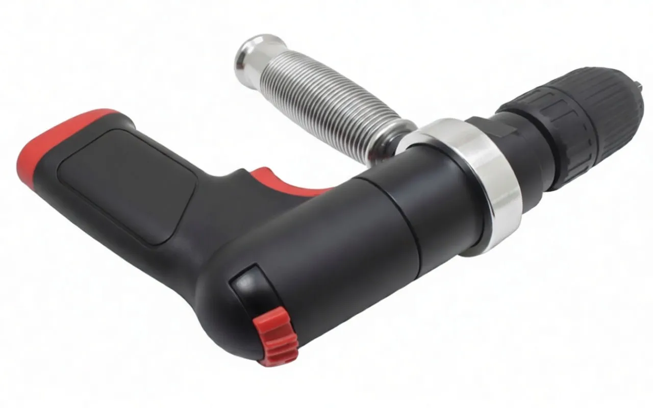 Angled bottom view of air drill showing rear controls, reverse switch, and ASTA logo