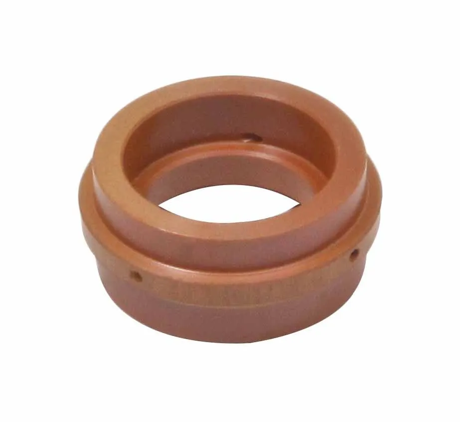 Top-front view of copper/orange plasma nozzle showing inner recess and outer port holes