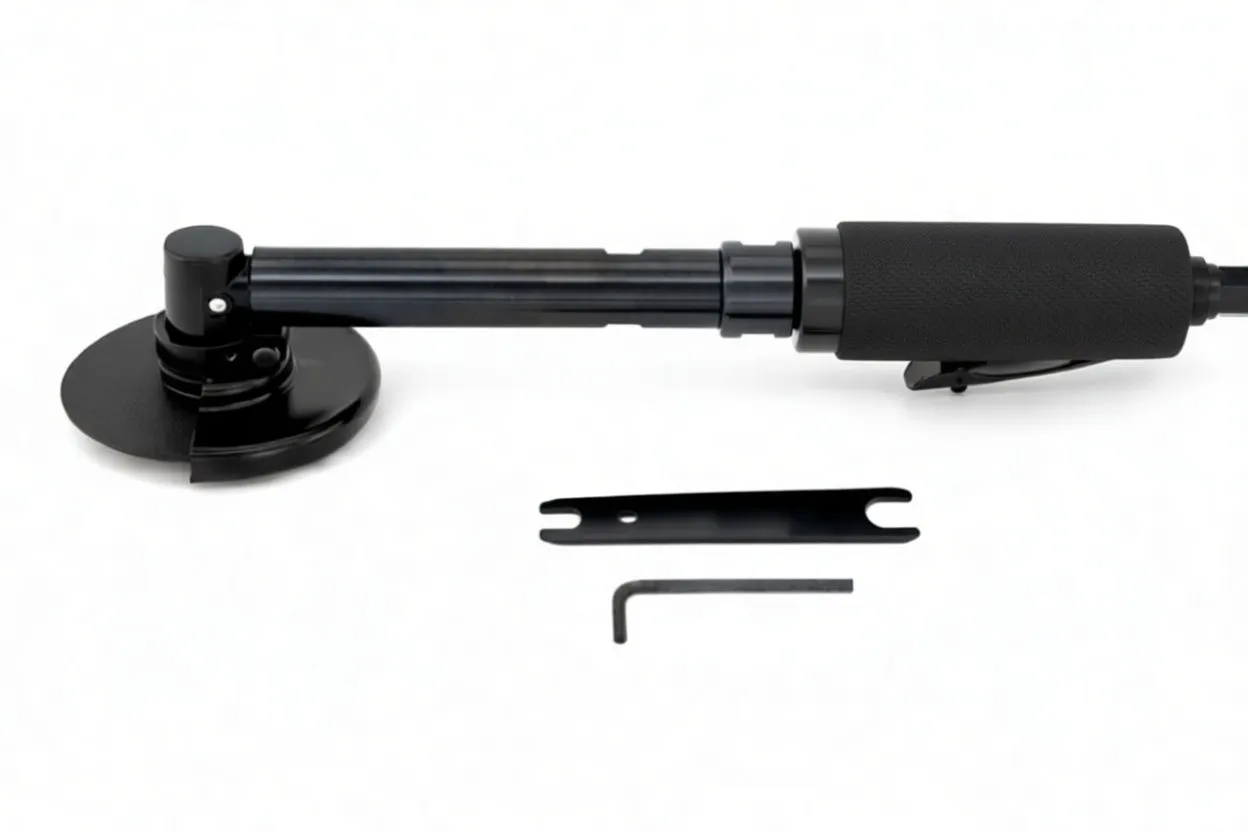 Side profile of a Pneumatic 4-inch long angle grinder (ASTA logo) with guarding disc, plus a spanner wrench and hex key laid out below.