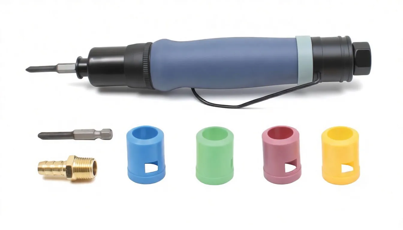 Horizontal overhead shot of air screwdriver with bits, brass adapter and four colored plastic collars in a row