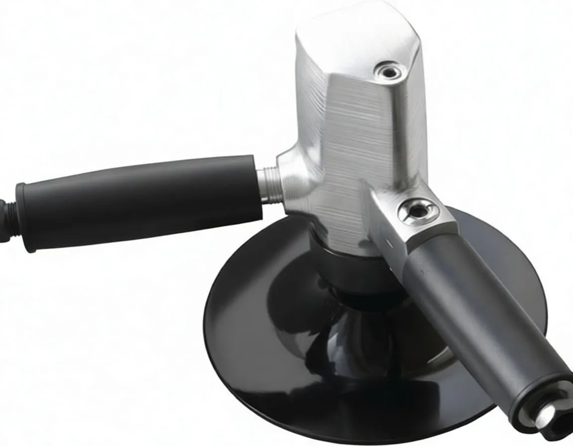 Three-quarter rear view of a silver disc sander with two black handles, a blue circular logo on the housing, a black sanding disc, and warning labels on the handle and pad.