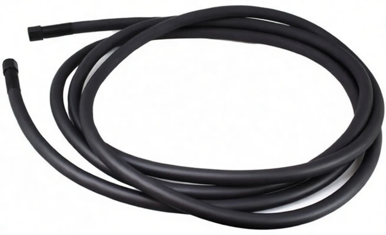 Coiled black high-pressure grease hose with brass fittings and white SAE/3500 PSI markings