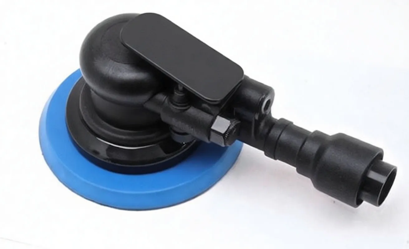 Side view of black palm orbital sander showing top lever, hose/air fitting, blue 6-inch pad and specification sticker