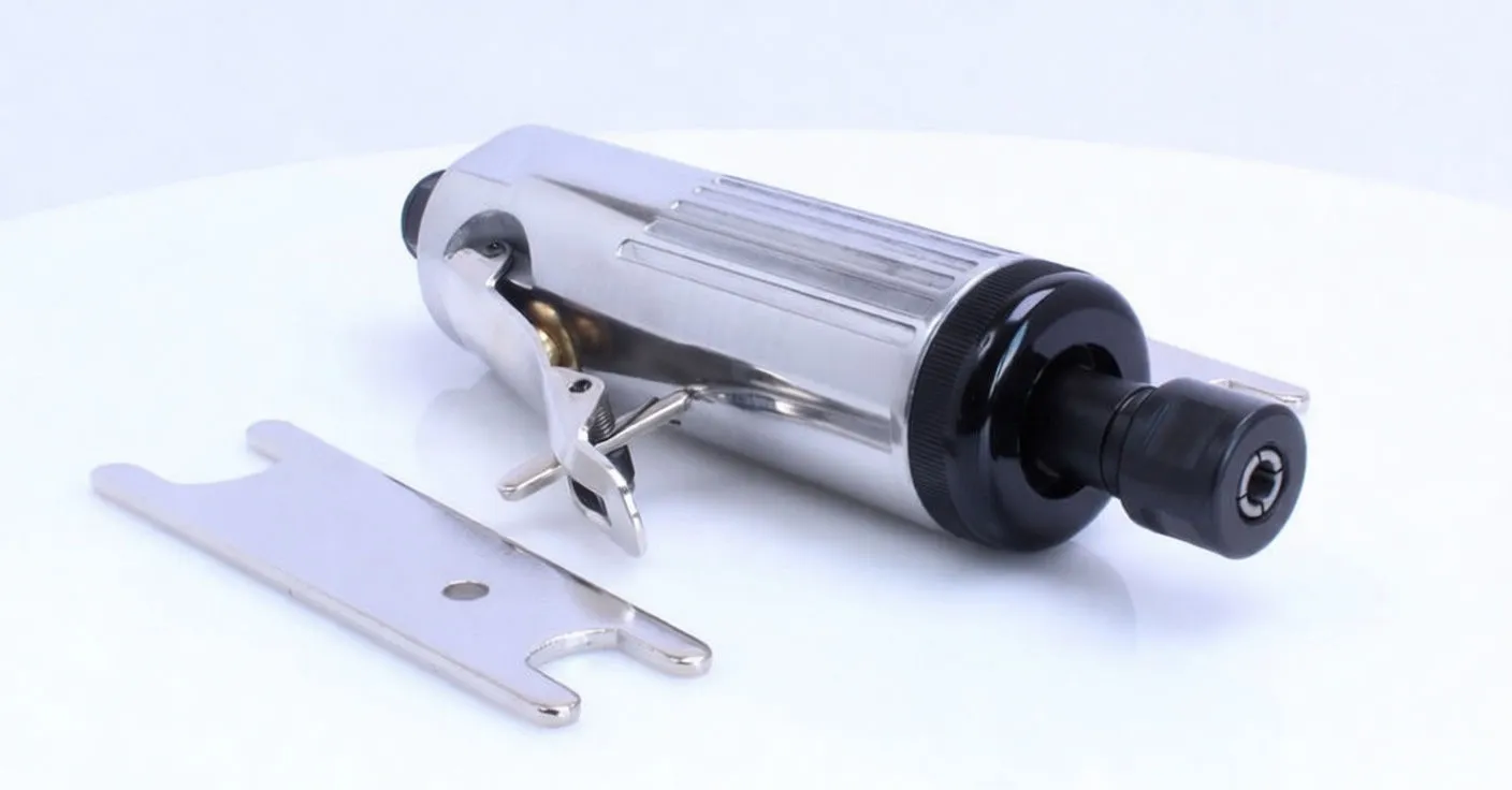 Angled view of positive-grip collet chuck on white surface with a flat spanner wrench, showing brand decal and label